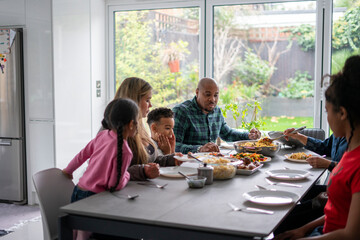 Family eating dinner together