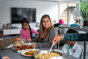 Family eating dinner together