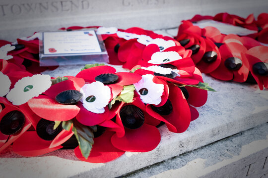 Remembrance Day Poppy Wreaths Laid On The War Memorial In Witney, Oxfordshire.