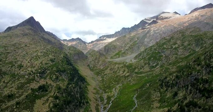 Majestic view of Aneto, highest mountain in Spanish Pyrenees of Benasque valley.
