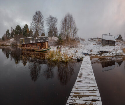 The first snow in a Russian fishing village. Veps region. Leningrad region. Russia