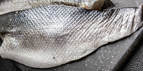 seafood fish sea ​​bass fillet meal food snack on the table copy space food background top