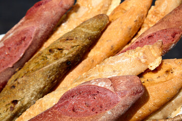 Different types of delicious baguette bread. Selective focus