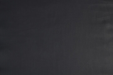 Black leather background texture close-up