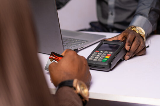 African Man Offers A Pos Device For Payment