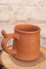 Ceramics, a ceramic product made with their own hands, made on a potter's wheel, jug, mug, clay, ornament.