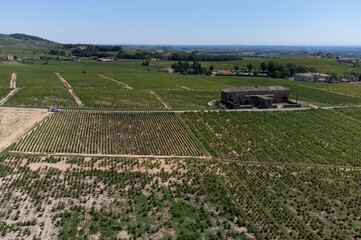 Aerial view on vineyards and villages near Mont Brouilly, wine appellation Côte de Brouilly beaujolais wine making area along Beaujolais Wine Route,  France