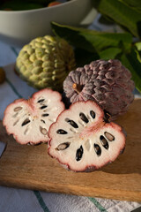 Cherimoya or custard apple tasty tropical exotic fruits close up
