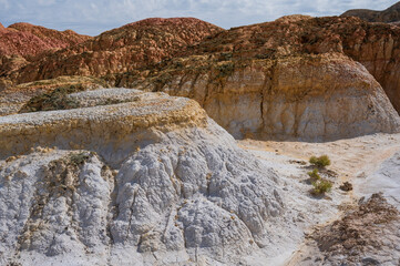 Landscape of multi-colored clay dunes. Mars on earth.