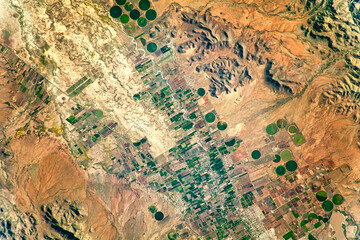 Agricultural plains of San Miguel River in Mexico. Digital Enhancement. Elements by NASA