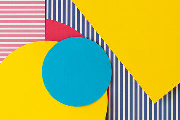 Abstract trendy fashion colored papers texture background in memphis geometry style. Yellow, red,...