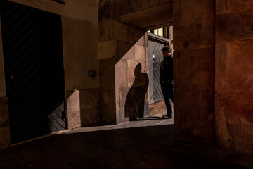 Copenhagen, Denmark A man in an old arched passageway at the Christiansborg Palace, site of...
