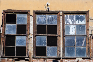 Old abandonded wooden window house in Drama city