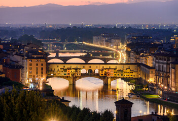 Fototapeta na wymiar Ponte Vecchio bridge over Arno river at sunset, Florence, Italy