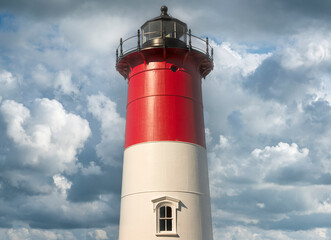 Lighthouse and summer clouds