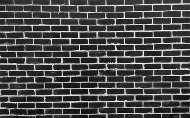Empty black brick wall texture background in the bedroom. Brickwork stonework interior, rock old clean concrete grid uneven abstract weathered brick design, horizontal architecture wallpaper.