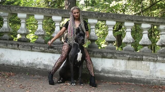 Woman with great dane dog on the photoshoot
