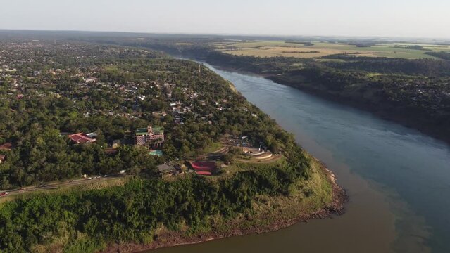 circular drone flight shows Hito tres fronteras at the Iguazu River Monument in Misiones, where the borders of Brazil, Argentina and Paraguay meet.