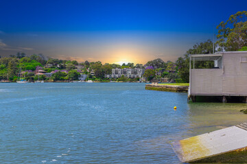 Fototapeta premium Sydney Harbour foreshore Parramatta River NSW Australia. Beautiful residential apartment building and house on the foreshore