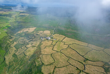 Aerial view of the rugged farmland of Cornwall in West England