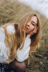 Close up outdoor portrait of young beauty blondie caucasian girl