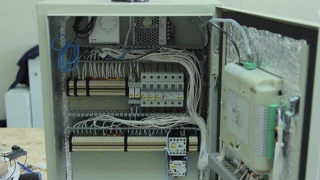 Electric switchboard case with cables and circuit breakers