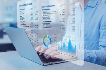Accountant analysing financial statement with graph on computer. Auditing balance sheet, sales and income report, business operations data, corporate accounts. Finance and consulting. - obrazy, fototapety, plakaty