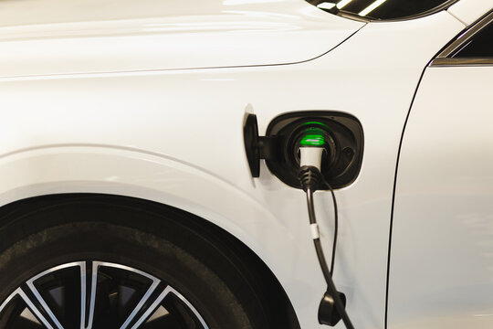 Electric car charging station with vehicle charing batteries. Future of Transportation.