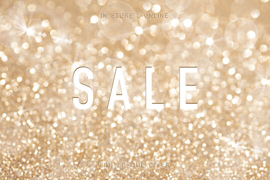 Sale poster design over golden lights with graduated bands of different sparkling and twinkling bokeh from party lights and glitter for your seasonal advert