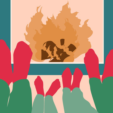 Family rest on Christmas holidays, feet of parets and two children in red socks in front of a fireplace with fire flames. Minimalism vintage style