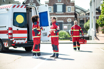 Paramedical staff communicating before the work shift