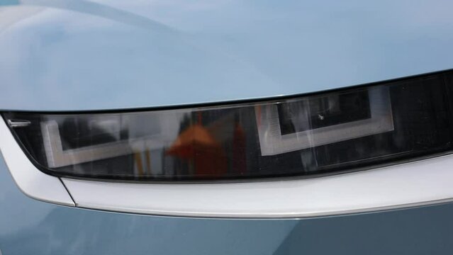 Close up shot of a modern car LED headlights.