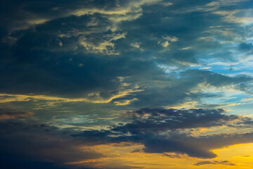 clouds in the sky illuminated by the sun summer evening. background