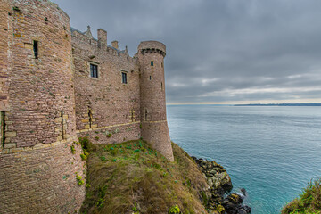 Beautiful old castle Fort La Latte is located on a peninsula and the only access to the fort is via the drawbridge, Cap Frehel, Brittany, France