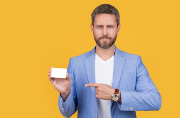 businessman point finger on business card with copy space. businessman holding business card