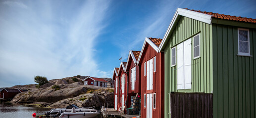 Beautifull fishermans village in swedish town called Smögen. Colorfull fishermans hut with boats...