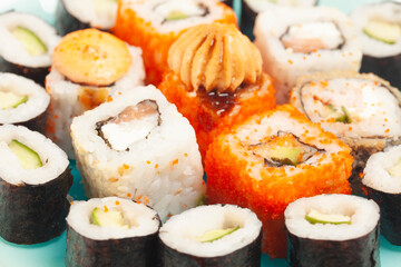 Sushi rolls japanese food on a plate top view