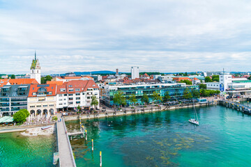 Fototapeta na wymiar Germany, Friedrichshafen city coast bodensee lake houses promenade lakeside summer, aerial panorama view above buildings