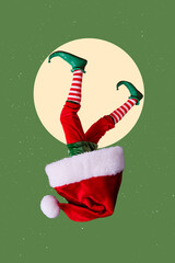 Vertical creative collage illustration photo of funny upside down bodyless elf legs sticking out of hat isolated on green color background - obrazy, fototapety, plakaty