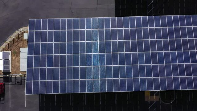 Overhead aerial view showing the texture of solar panels from above.