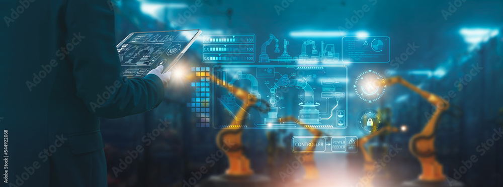 Wall mural industry engineer in factory,using smart tablet glass device,control automated robot arm machine lea