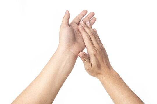 Close up of two hands reaching and holding for first person point of view, Isolated on white background.
