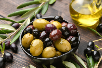 healthy food salad different green and black olives with olive oil and herbs