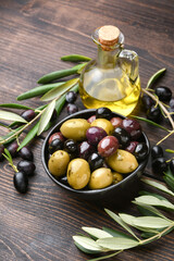 healthy food salad different green and black olives with olive oil and herbs