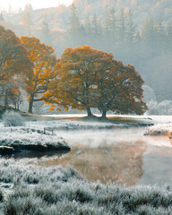 Winter in the Lake District.  Icy morning at River Brathay, frost-covered landscape, misty river. 