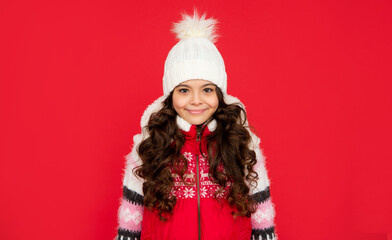 cheerful teen girl on red background.