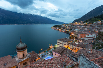 Naklejka na ściany i meble Limone, Lake Garda, Italy. Blue hour,. European Tourism