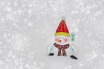 Obraz premium Metal snowman decoration out in the snow