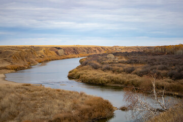 The Ishim River is a riverbed, an autumn landscape.