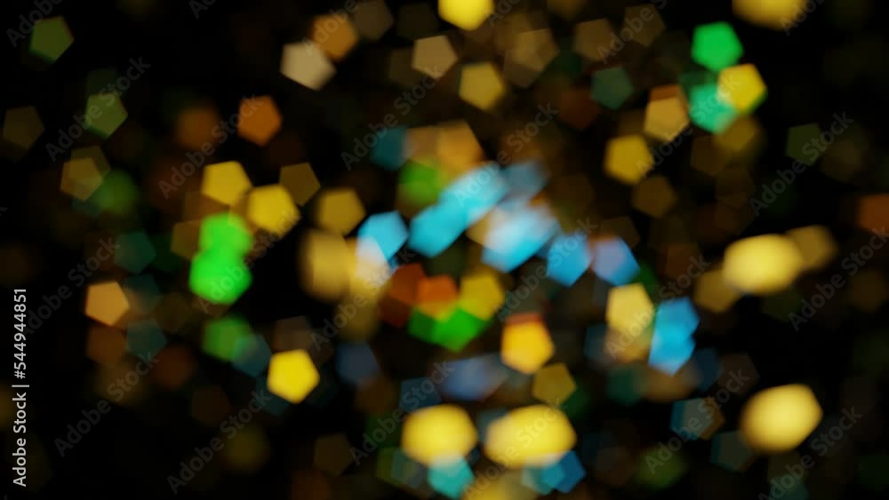 Poster multi-colored bokeh spots moving on a black background. looped animated background. 3d render.